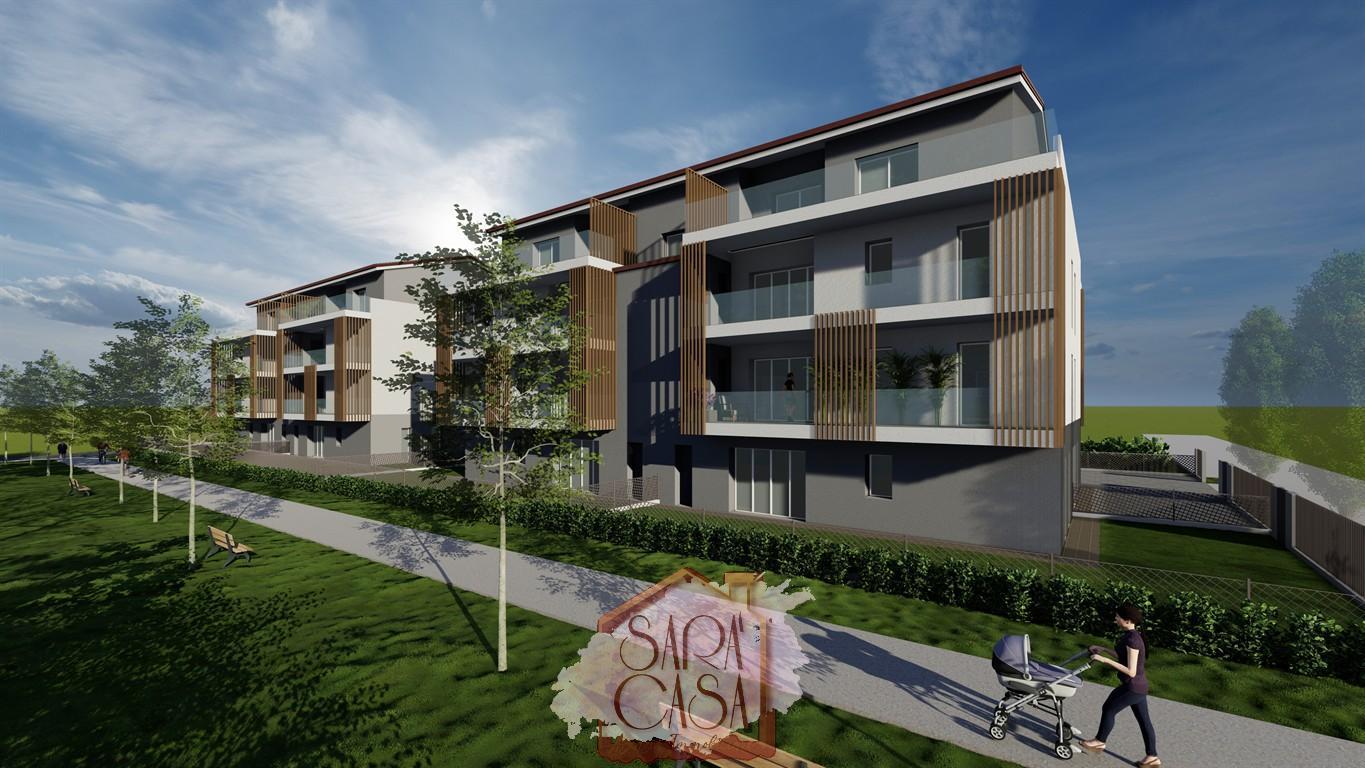 MODERNO TRILOCALE CON GIARDINO PRIVATO E CANTINA
