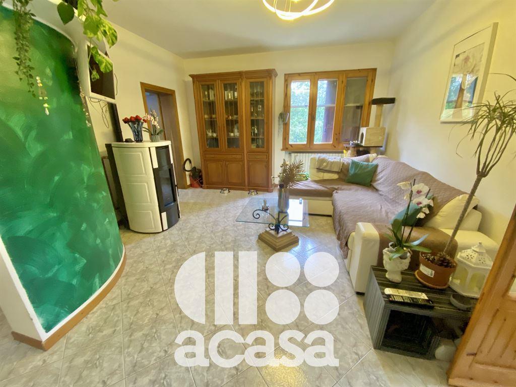 APPARTAMENTO CON TERRENO IN BIFAMILIARE