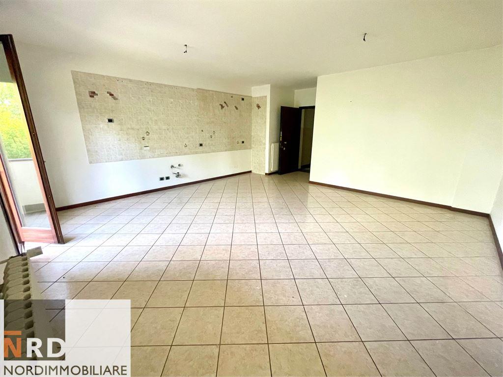 Bel TRILOCALE con Garage e Porzione di Giardino
