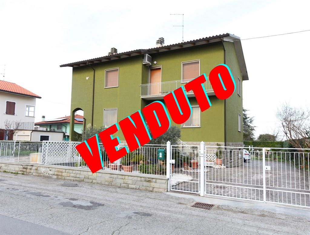 APPARTAMENTO CON GIARDINO IN BIFAMILIARE