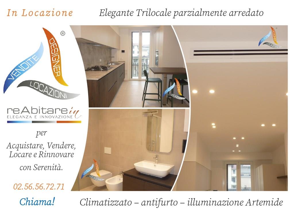 Elegante Trilocale parzialmente arredato - illuminazione Artemide