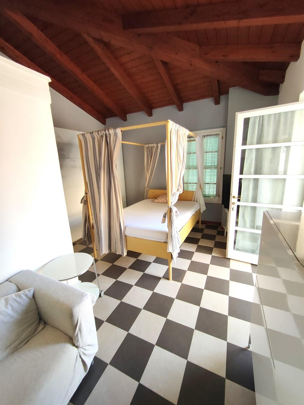 Lecco vendesi ampio monolocale con giardino e posto auto