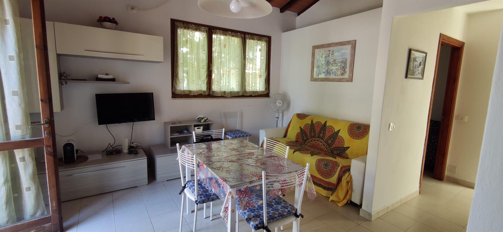 Trilocale con giardino e posto auto