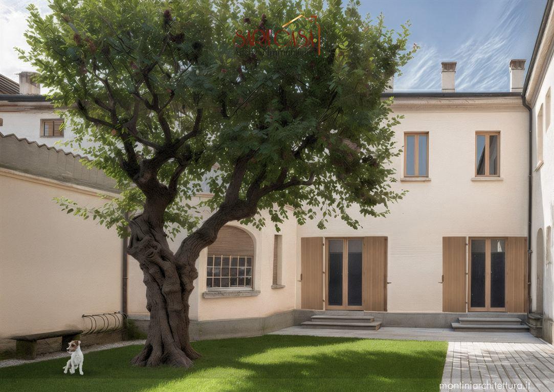 APPARTAMENTO CON DUE CAMERE DA LETTO E CORTE PRIVATA