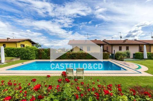 Trilocale signorile con giardino e piscina