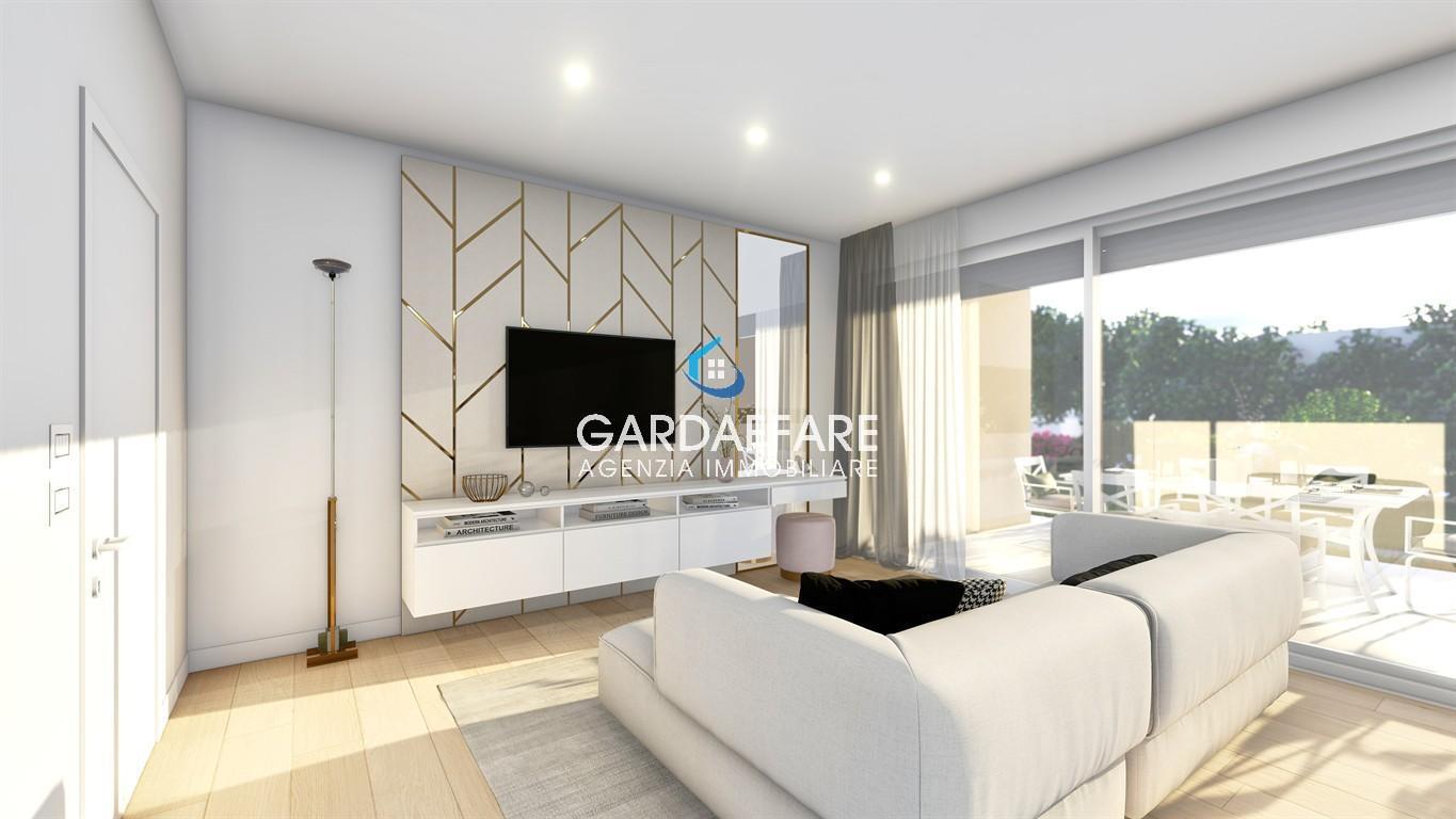 Nuovo Attico Trilocale con terrazza Vista lago in residence con piscina!