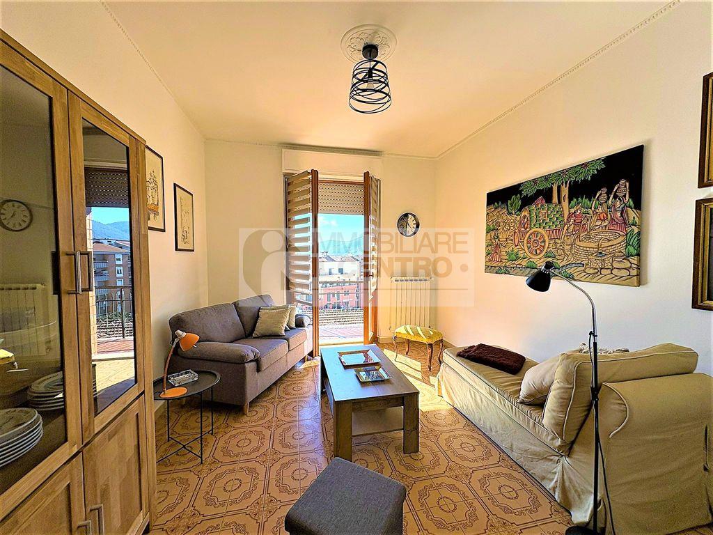 Appartamento in centro con posto auto.