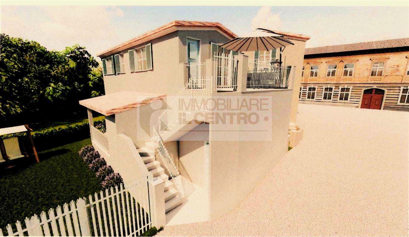 SEMINDIPENDENTE CON GIARDINO E POSTO AUTO